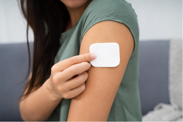 transdermal patch on arm